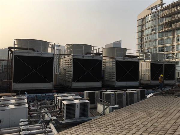 風(fēng)筒的漂流水對開式冷卻塔的影響